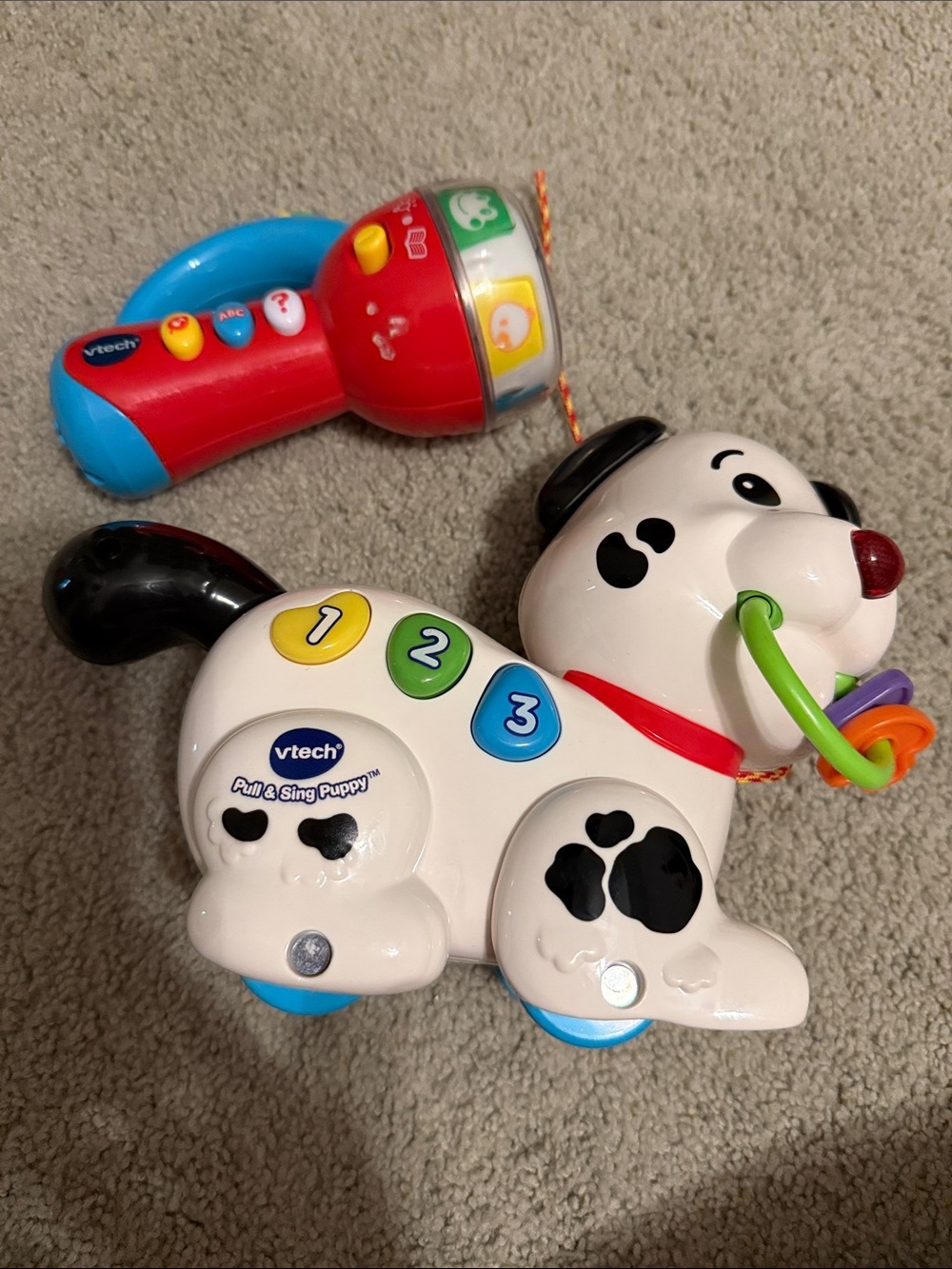 VTech Pull & Sing Puppy - White and Black Educational Pull Toy